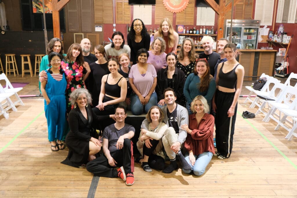 Performers, dancers, choreographers and host who participated in this project pose for a photo