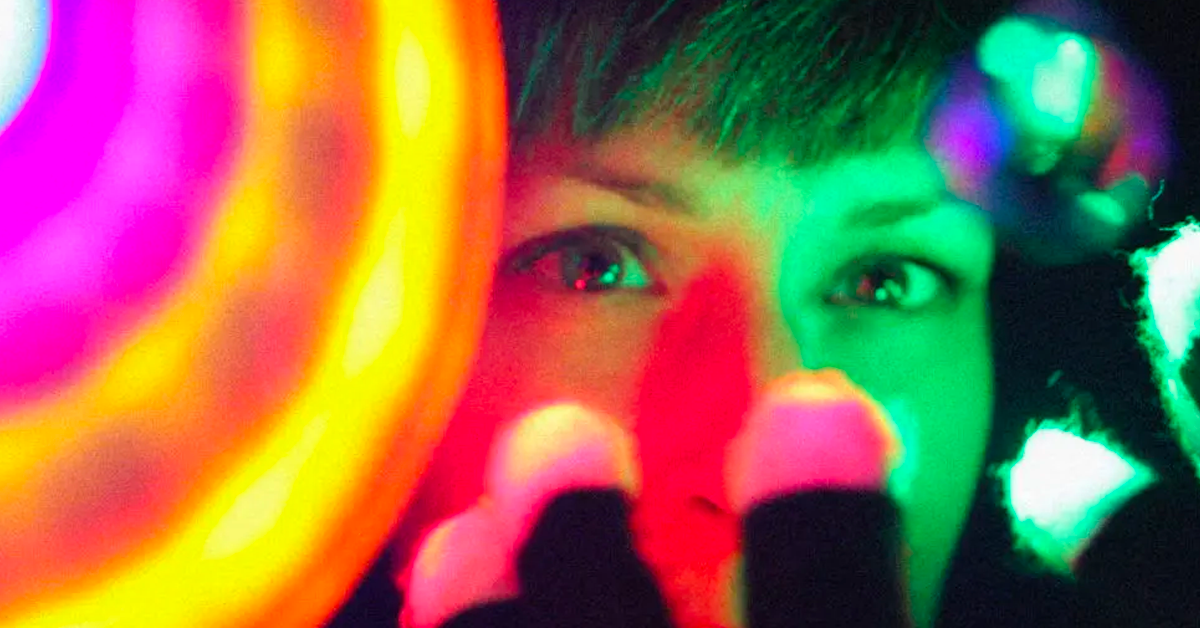 Colorful lights with girls eyes in background
